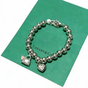 Tiffany & Co. Silver Bracelet with Pink Accent